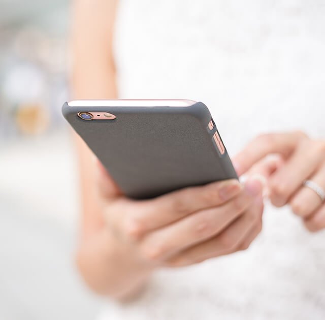 woman-use-of-cellphone-2023-11-27-05-05-46-utc (1)